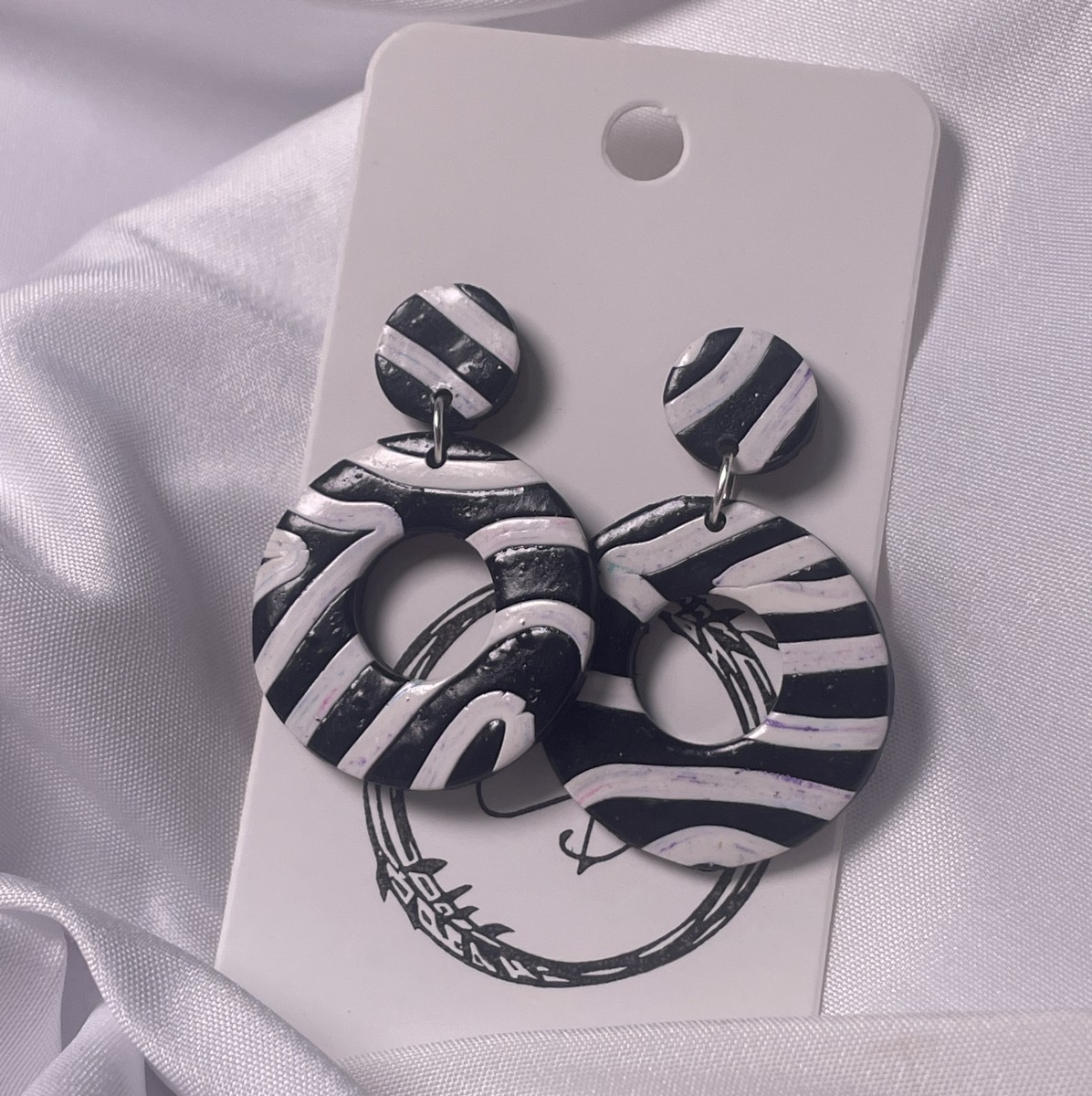 Zebra Swirl Hoops - $20
